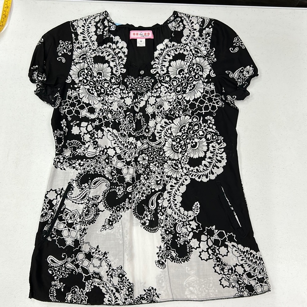 Koi Brand top.  Size Small.  Worn as scrubs.  One owner.  Excellent condition.